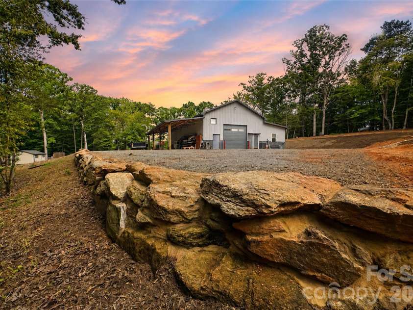 1147 Whispering Winds Drive, Catawba, NC 28609.  MLS# CAR4405476, YatesRealty ID 39802. Barndominion Accessory Structure view with Lot Improvements including Grading, Retaining Walls, Culvert Draining and More