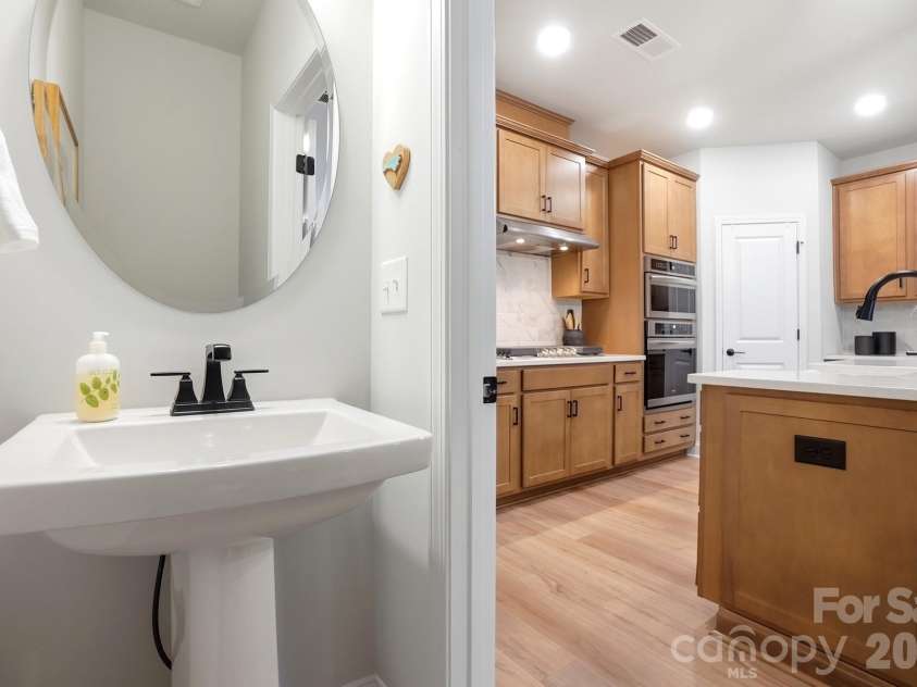 1128 Drummond Avenue, Charlotte, NC 28205.  MLS# CAR4405156, YatesRealty ID 39807. Half Bath on Main Floor
