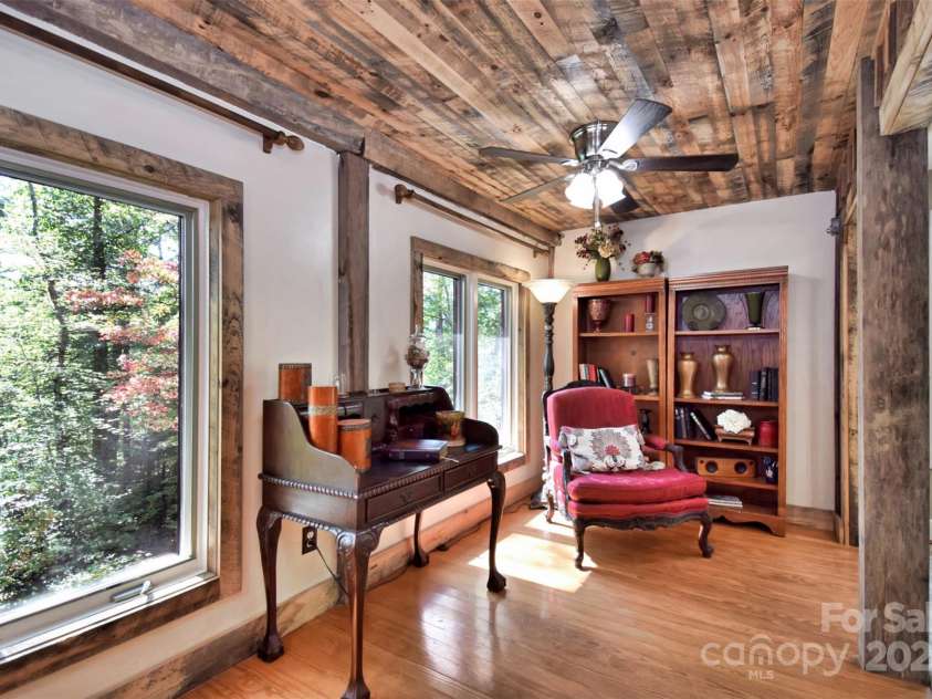 23022 Linville Falls Highway, Linville Falls, NC 28647.  MLS# CAR4178209, YatesRealty ID 3981. Snuggle up with a book for a cozy read in the Keeping Room off of the gourmet kitchen.