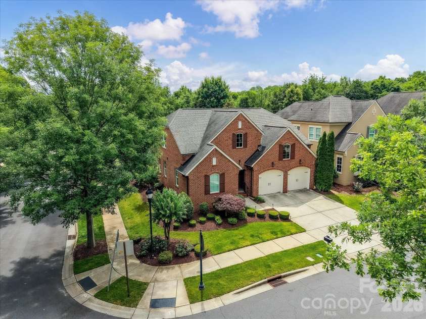 16620 Redding Park Lane, Cornelius, NC 28031.  MLS# CAR4404866, YatesRealty ID 39811. Beautifully maintained full brick home with exceptional curb appeal, a spacious three-car garage, and professionally landscaped grounds in a highly desirable community.