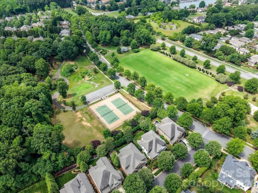 16620 Redding Park Lane, Cornelius, NC 28031.  MLS# CAR4404866, YatesRealty ID 39811. Community amenities include tennis courts, expansive open green space, scenic walking trails, and inviting parks just moments from your front door.