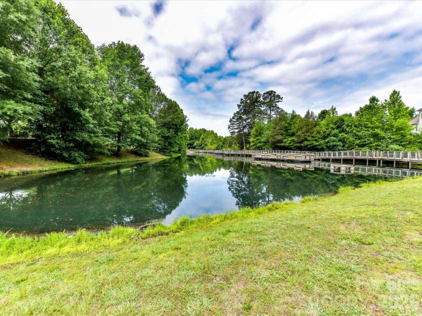 16620 Redding Park Lane, Cornelius, NC 28031.  MLS# CAR4404866, YatesRealty ID 39811. Lake Saint Henry offers a peaceful waterfront setting with scenic walking trails, a boardwalk, and tranquil views just moments from home.