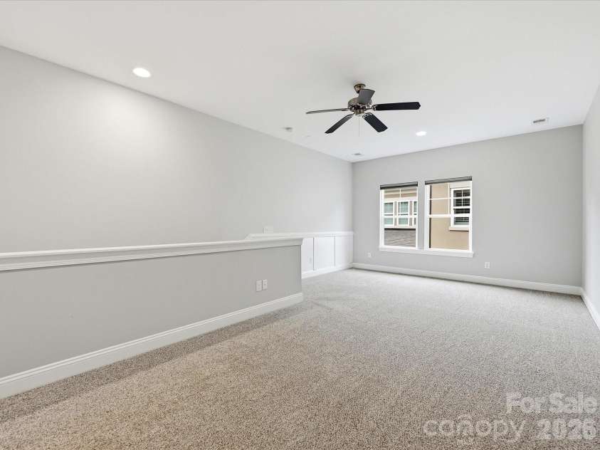 16620 Redding Park Lane, Cornelius, NC 28031.  MLS# CAR4404866, YatesRealty ID 39811. This oversized loft delivers exceptional versatility with plenty of room for entertaining, relaxing, or creating the ideal flex space.