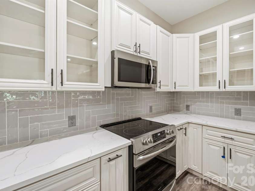 4412 Lake Forest Road, Denver, NC 28037.  MLS# CAR4404304, YatesRealty ID 39820. Lower Level Kitchen