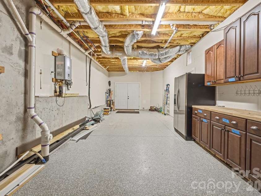 4412 Lake Forest Road, Denver, NC 28037.  MLS# CAR4404304, YatesRealty ID 39820. Lower Level Workshop