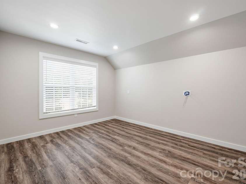 4412 Lake Forest Road, Denver, NC 28037.  MLS# CAR4404304, YatesRealty ID 39820. Upper Level Bedroom with Bath and Storage
