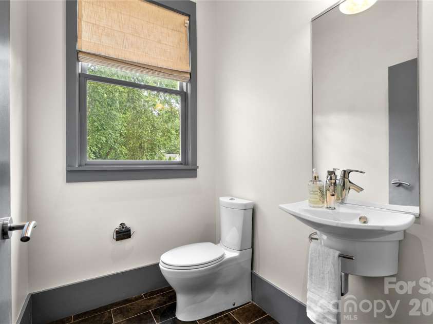 31 Grey River Run, Woodfin, NC 28804.  MLS# CAR4403960, YatesRealty ID 39822. Half-bathroom on main level