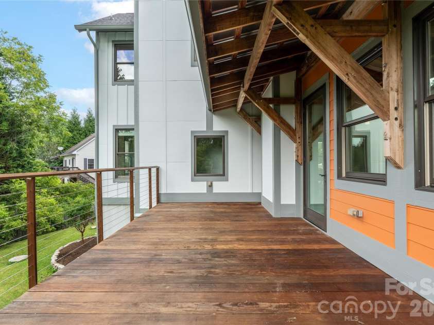 31 Grey River Run, Woodfin, NC 28804.  MLS# CAR4403960, YatesRealty ID 39822. Large deck off living room