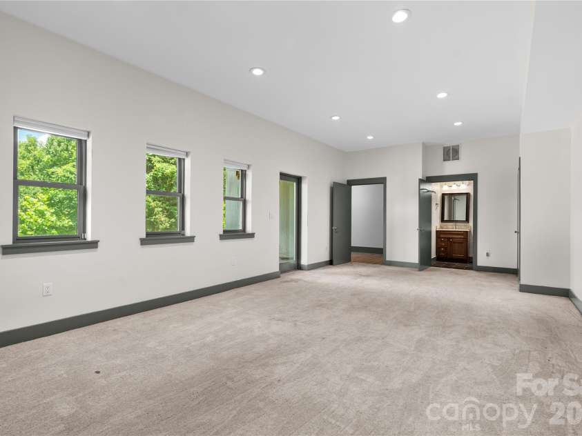 31 Grey River Run, Woodfin, NC 28804.  MLS# CAR4403960, YatesRealty ID 39822. Lower level bonus room