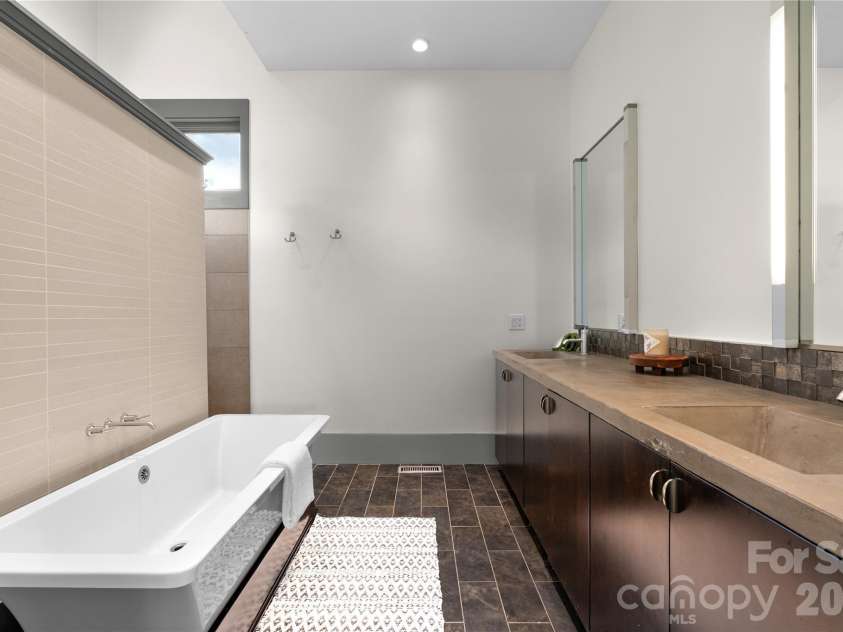 31 Grey River Run, Woodfin, NC 28804.  MLS# CAR4403960, YatesRealty ID 39822. Primary suite bathroom