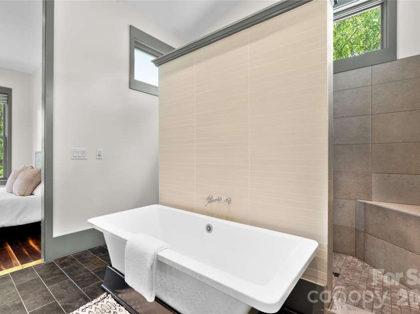31 Grey River Run, Woodfin, NC 28804.  MLS# CAR4403960, YatesRealty ID 39822. Primary suite bathroom