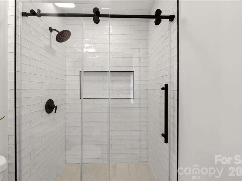 2000 Lawton Bluff Road, Charlotte, NC 28226.  MLS# CAR4403159, YatesRealty ID 39834. Primary shower