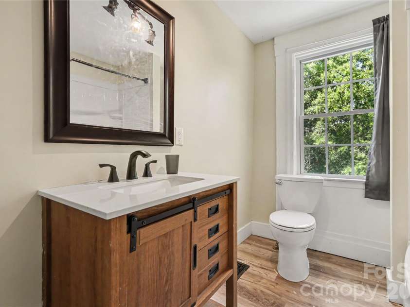 159 Lacy Street, Chester, SC 29706.  MLS# CAR4401942, YatesRealty ID 39836. Upstairs Bathroom