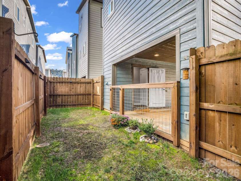 9 Citra Street, Arden, NC 28704.  MLS# CAR4299774, YatesRealty ID 3984. Backyard