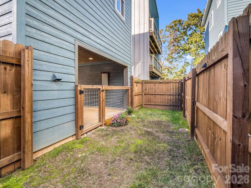 9 Citra Street, Arden, NC 28704.  MLS# CAR4299774, YatesRealty ID 3984. Backyard