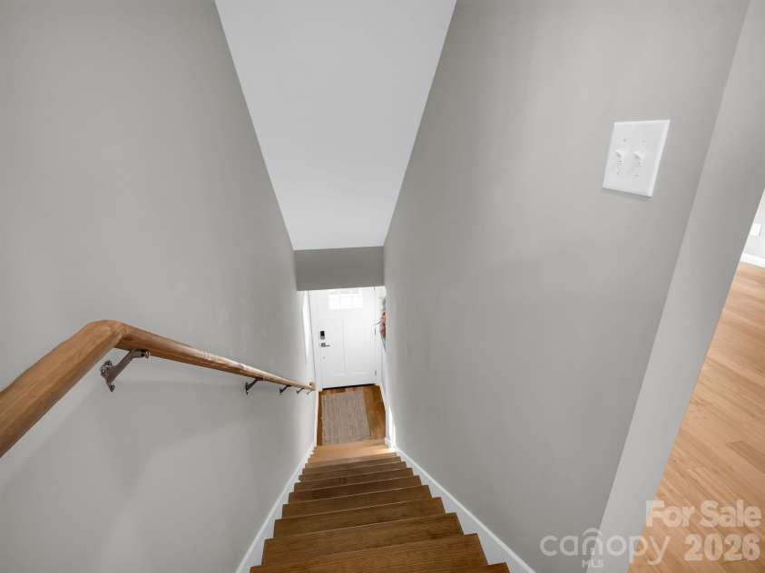 9 Citra Street, Arden, NC 28704.  MLS# CAR4299774, YatesRealty ID 3984. Stairs to outside