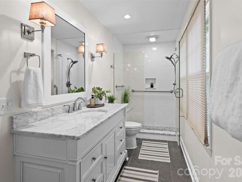 175 Woodstream Circle, Mooresville, NC 28117.  MLS# CAR4400263, YatesRealty ID 39843. Lower Level Primary Bath