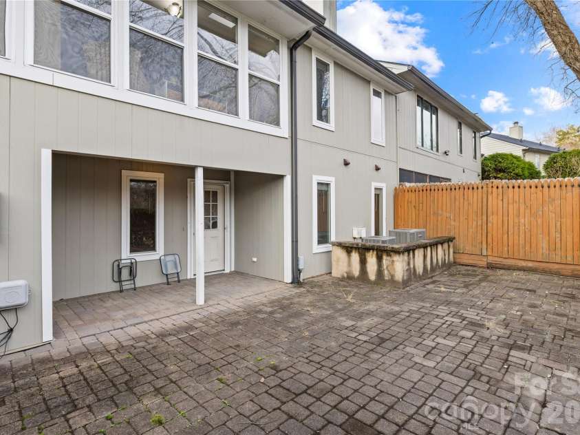 1002 Kenilworth Court, Concord, NC 28027.  MLS# CAR4327235, YatesRealty ID 3985. Covered porch 