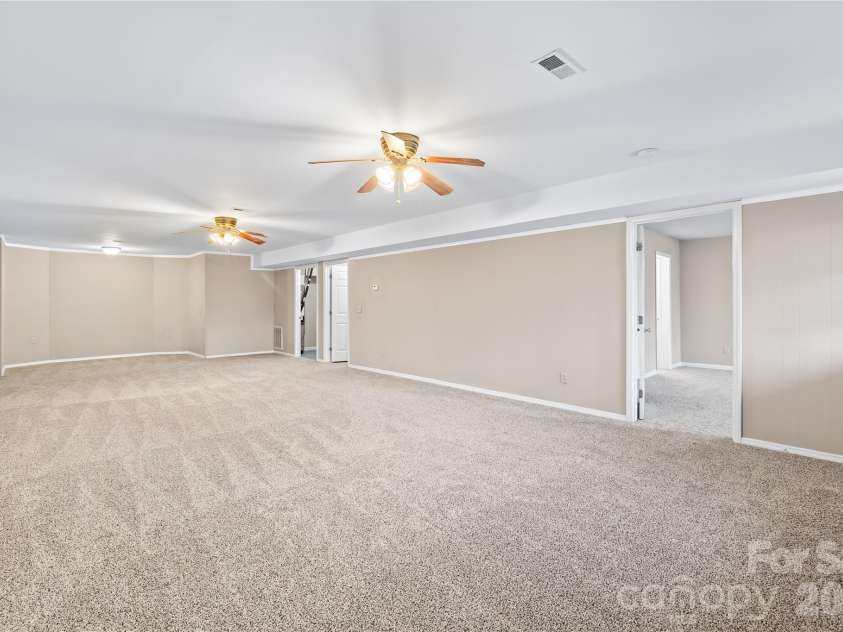 1002 Kenilworth Court, Concord, NC 28027.  MLS# CAR4327235, YatesRealty ID 3985. Finished basement