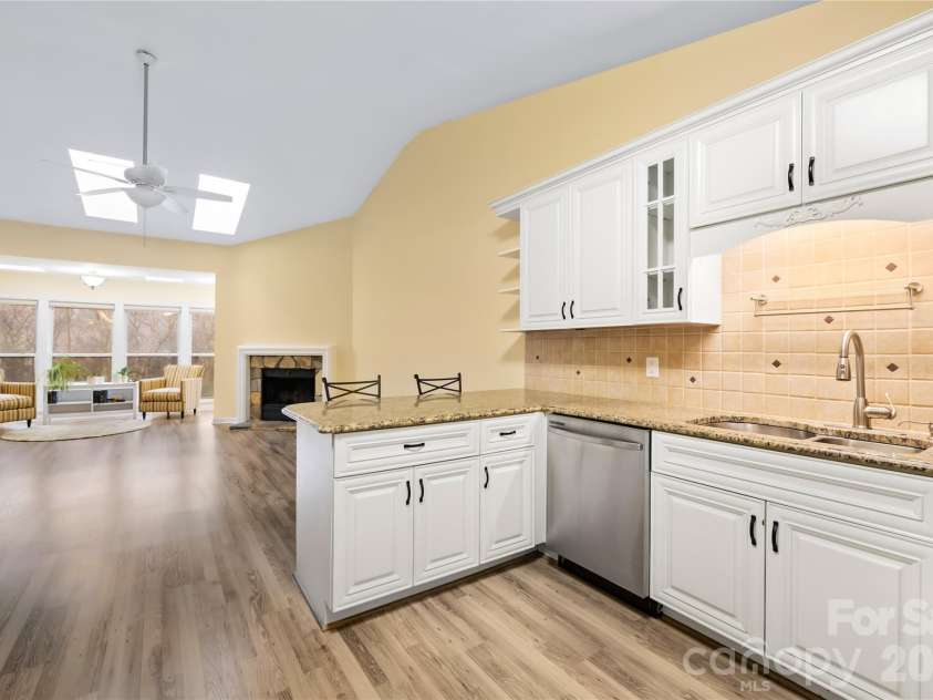 1002 Kenilworth Court, Concord, NC 28027.  MLS# CAR4327235, YatesRealty ID 3985. Open kitchen with sightlines to living area