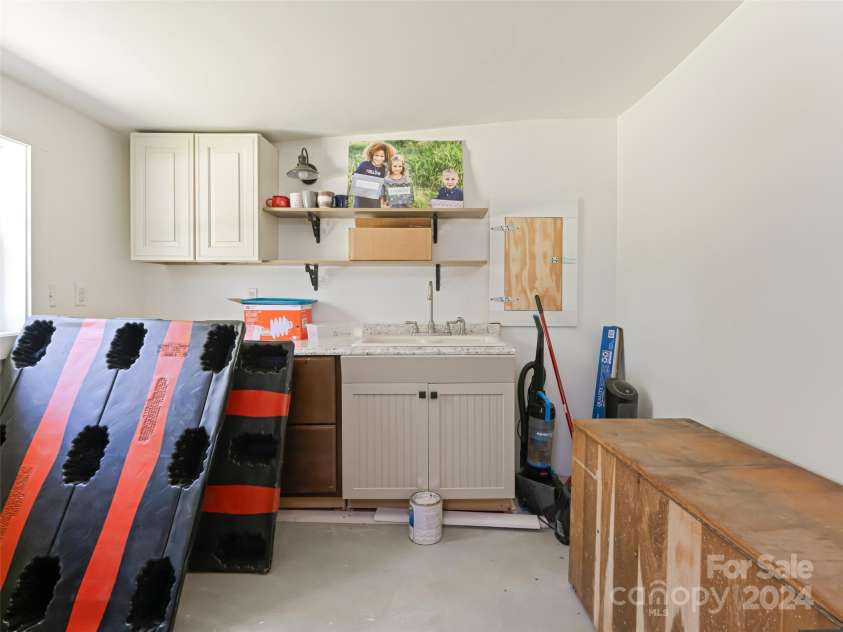 610 Long Shoals Road, Arden, NC 28704.  MLS# CAR4199331, YatesRealty ID 3986. 