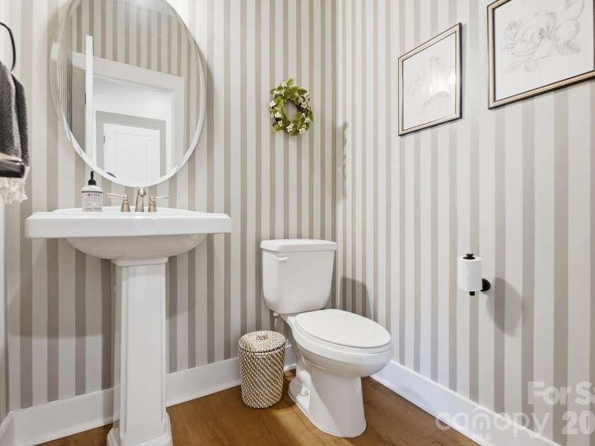 209 Church Street, McAdenville, NC 28101.  MLS# CAR4407372, YatesRealty ID 39862. Even the Half Bath Overflows w Charm.