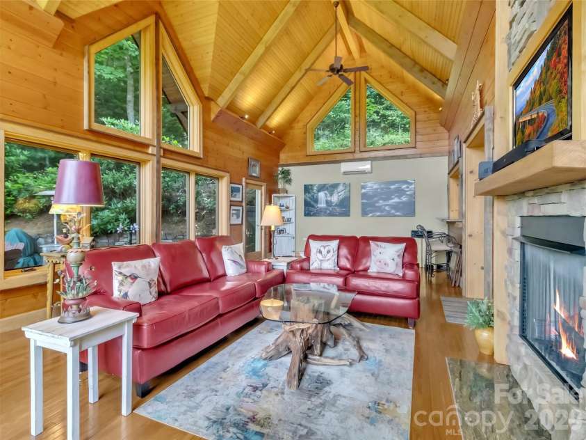 12 Signal Ridge, Sylva, NC 28779.  MLS# CAR4399435, YatesRealty ID 39863. Cozy Up by the Two Sided Fireplace