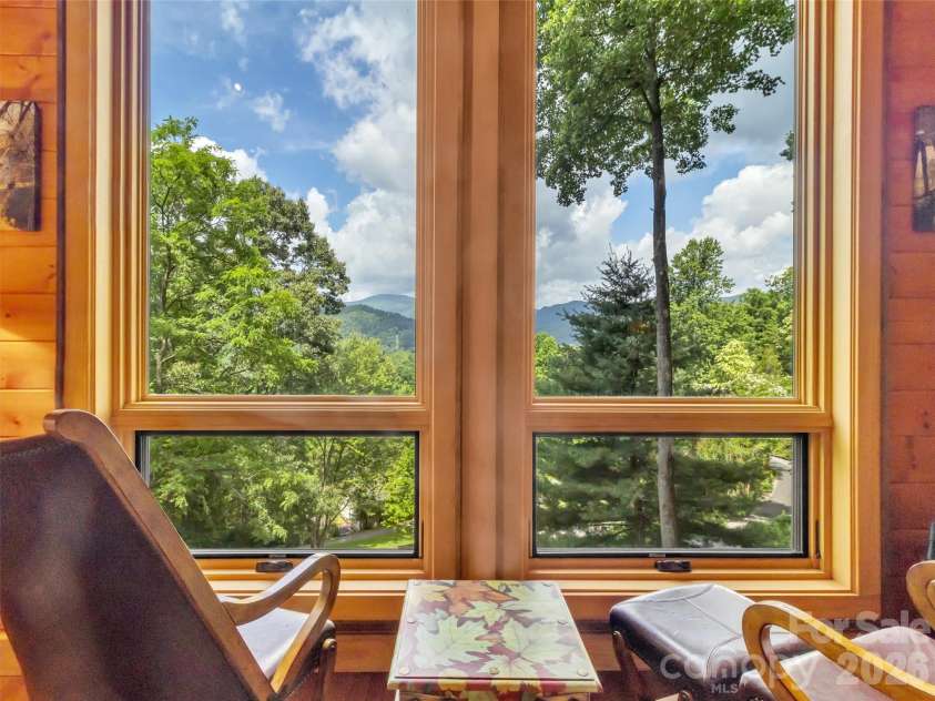 12 Signal Ridge, Sylva, NC 28779.  MLS# CAR4399435, YatesRealty ID 39863. Enjoy Looking Out at the VIEWS