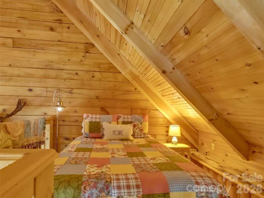 12 Signal Ridge, Sylva, NC 28779.  MLS# CAR4399435, YatesRealty ID 39863. Sleeping Area in Loft