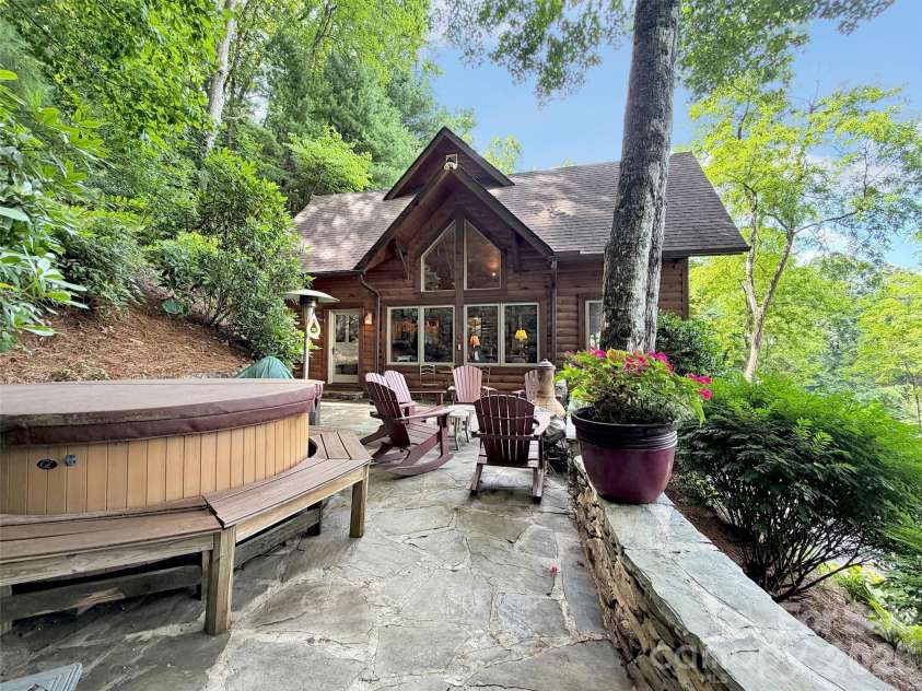 12 Signal Ridge, Sylva, NC 28779.  MLS# CAR4399435, YatesRealty ID 39863. Soak in the Hot Tub, while enjoying the VIEWS