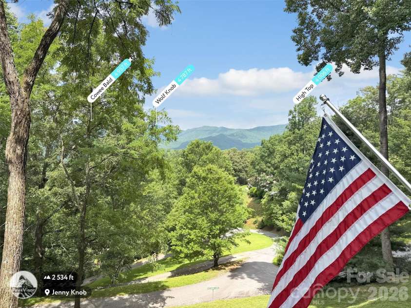 12 Signal Ridge, Sylva, NC 28779.  MLS# CAR4399435, YatesRealty ID 39863. Surrounded by VIEWS