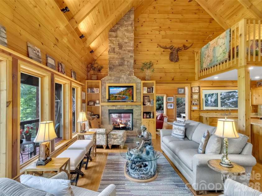 12 Signal Ridge, Sylva, NC 28779.  MLS# CAR4399435, YatesRealty ID 39863. Warm & Inviting Great Room