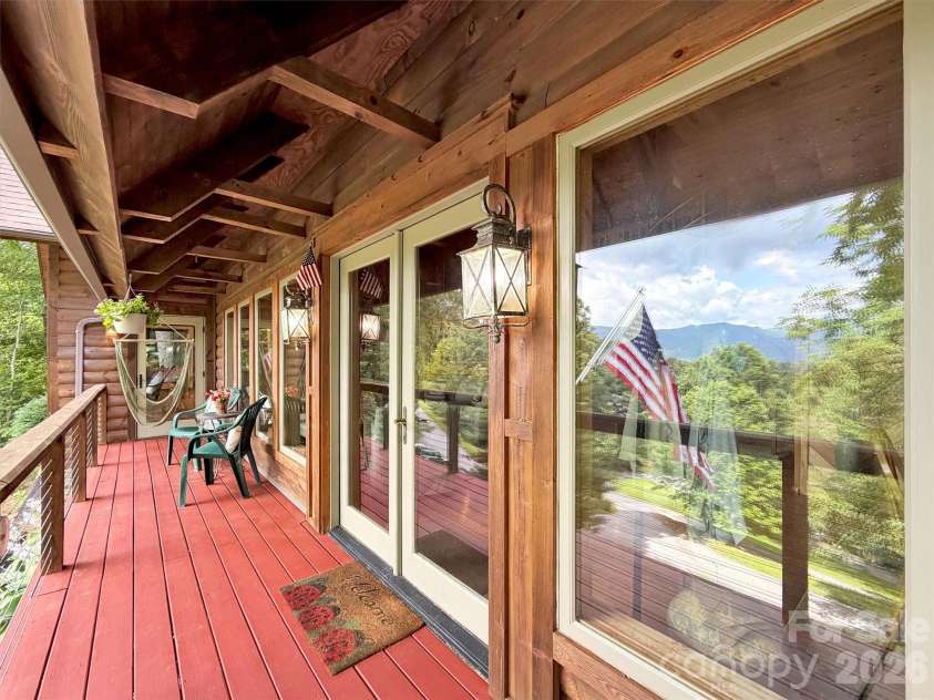 12 Signal Ridge, Sylva, NC 28779.  MLS# CAR4399435, YatesRealty ID 39863. Welcoming Covered Porch