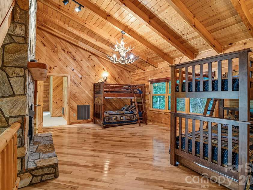 1482 Howard Moore Road, Hot Springs, NC 28743.  MLS# CAR4401313, YatesRealty ID 39864. Sleeping loft with Fireplace