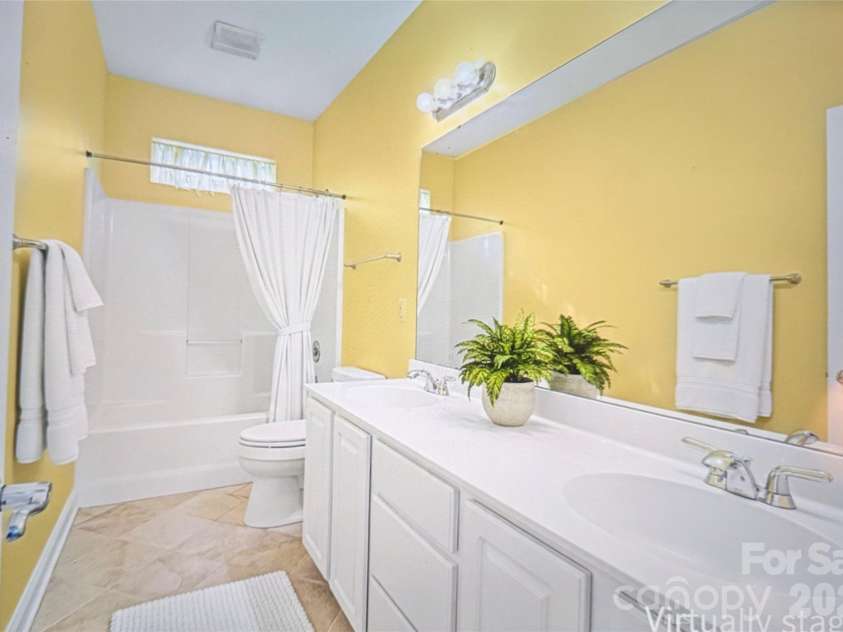 7039 Sedgebrook Drive, Stanley, NC 28164.  MLS# CAR4332906, YatesRealty ID 3987. Hall bathroom