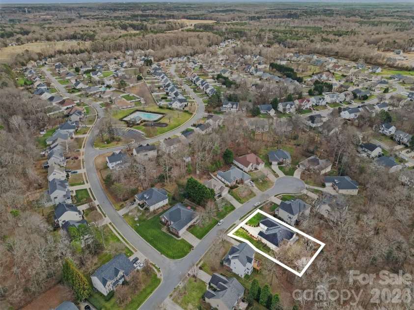 7039 Sedgebrook Drive, Stanley, NC 28164.  MLS# CAR4332906, YatesRealty ID 3987. Lot is 185 feet deep. Room to create a fire pit area