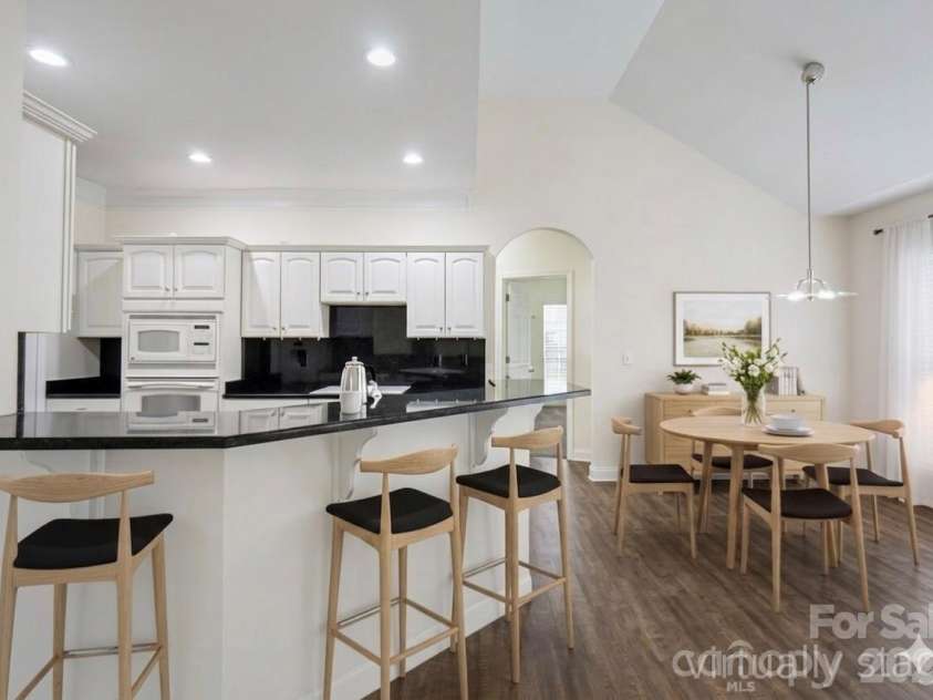 7039 Sedgebrook Drive, Stanley, NC 28164.  MLS# CAR4332906, YatesRealty ID 3987. Virtually staged kitchen and breakfast room
