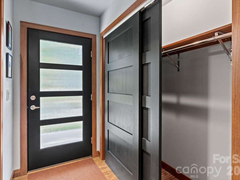 39 Wolf Road, Asheville, NC 28805.  MLS# CAR4397525, YatesRealty ID 39870. Back door and large coat closet