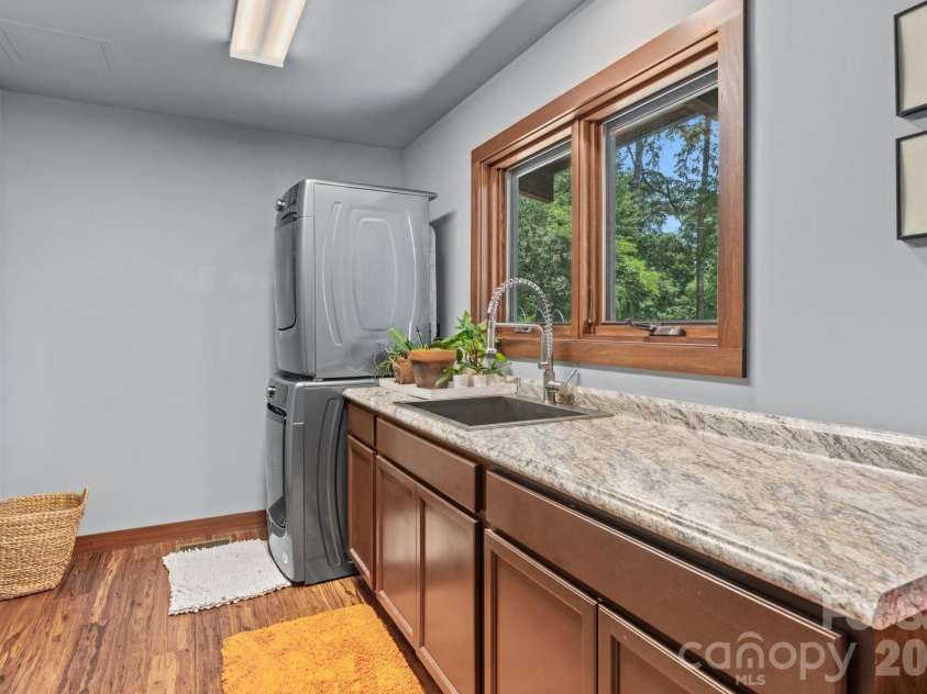 39 Wolf Road, Asheville, NC 28805.  MLS# CAR4397525, YatesRealty ID 39870. Laundry, mud room and storager