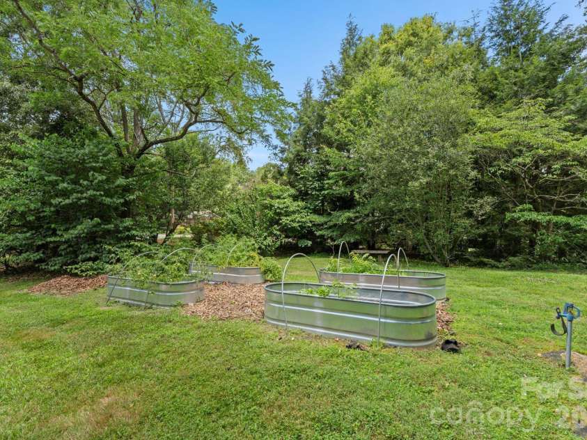 39 Wolf Road, Asheville, NC 28805.  MLS# CAR4397525, YatesRealty ID 39870. Raised Garden beds
