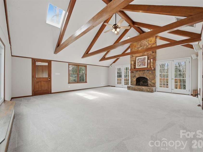 4041 4th Street Court, Hickory, NC 28601.  MLS# CAR4340977, YatesRealty ID 3988. Expansive Family RoomWooden door opens to enclosed breezeway leading to garage.