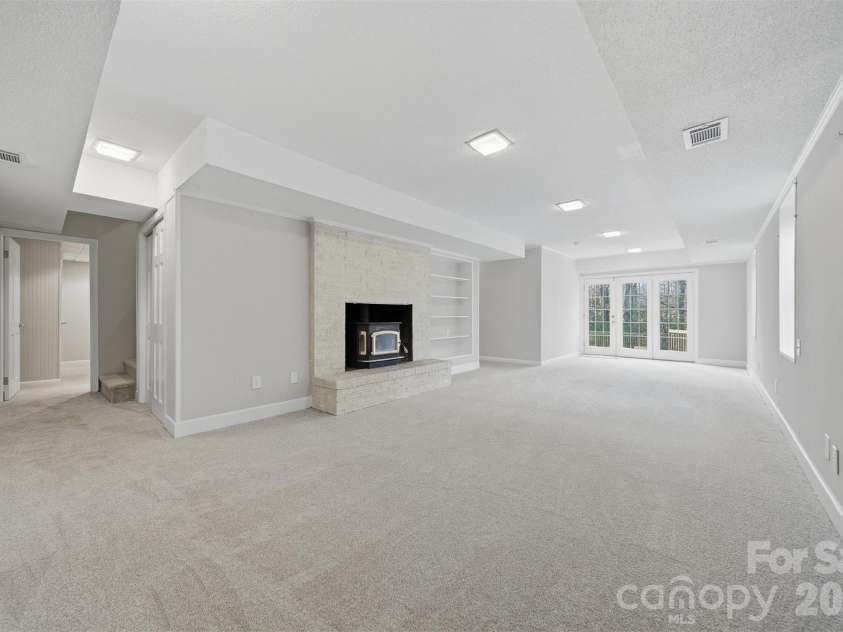 4041 4th Street Court, Hickory, NC 28601.  MLS# CAR4340977, YatesRealty ID 3988. Lower Level Rec Room with walk out to Back Yard and Pool Area