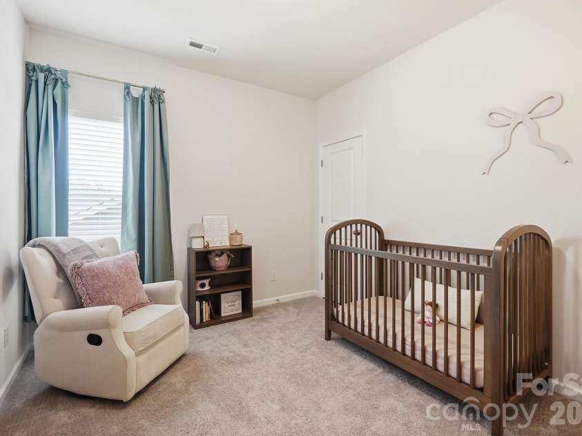 6023 Busch Way, Midland, NC 28107.  MLS# CAR4397614, YatesRealty ID 39883. Another bright secondary bedroom with a flexible layout.