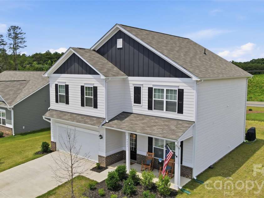 6023 Busch Way, Midland, NC 28107.  MLS# CAR4397614, YatesRealty ID 39883. Attractive curb appeal with an attached two-car garage.
