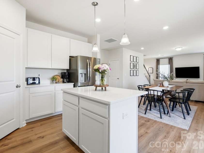 6023 Busch Way, Midland, NC 28107.  MLS# CAR4397614, YatesRealty ID 39883. Center island creates the perfect gathering place in the kitchen.