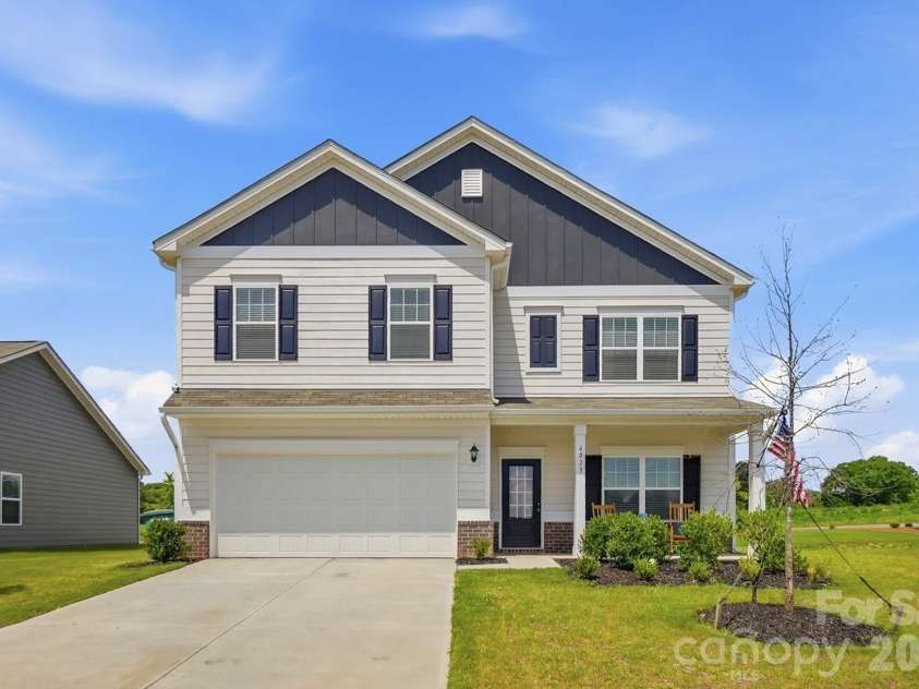 6023 Busch Way, Midland, NC 28107.  MLS# CAR4397614, YatesRealty ID 39883. Front exterior view showcasing the home’s classic design.