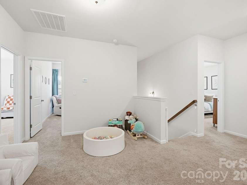 6023 Busch Way, Midland, NC 28107.  MLS# CAR4397614, YatesRealty ID 39883. Loft is ideal for a media room, playroom, or homework area.