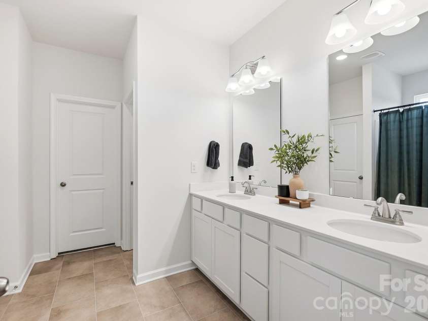 6023 Busch Way, Midland, NC 28107.  MLS# CAR4397614, YatesRealty ID 39883. Primary bath features an extended dual-sink vanity.