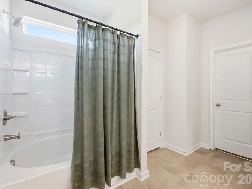 6023 Busch Way, Midland, NC 28107.  MLS# CAR4397614, YatesRealty ID 39883. Primary bath includes a garden tub with shower.