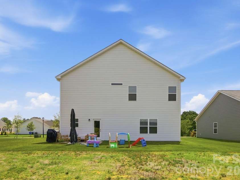 6023 Busch Way, Midland, NC 28107.  MLS# CAR4397614, YatesRealty ID 39883. Spacious backyard ready for play, pets, gardening, or outdoor entertaining.